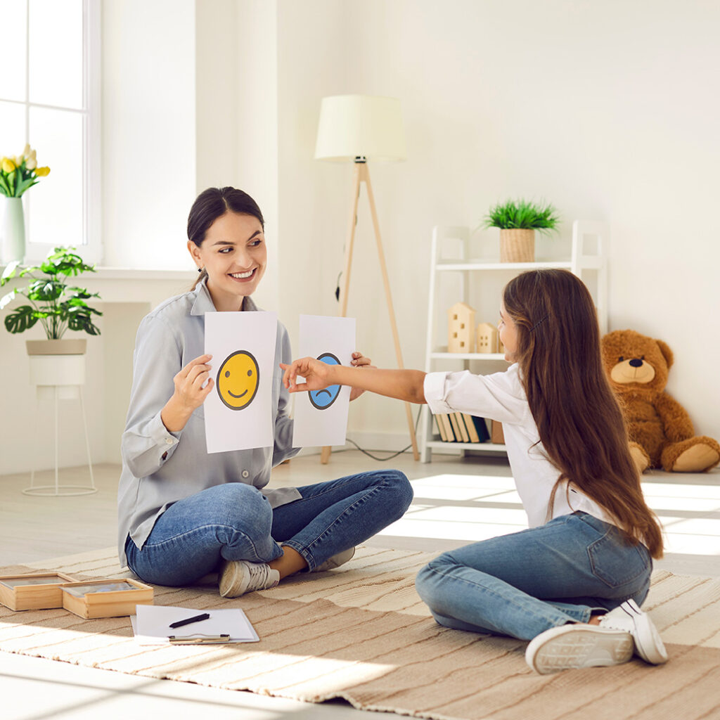 Behavioral therapy working with youth student in classroom