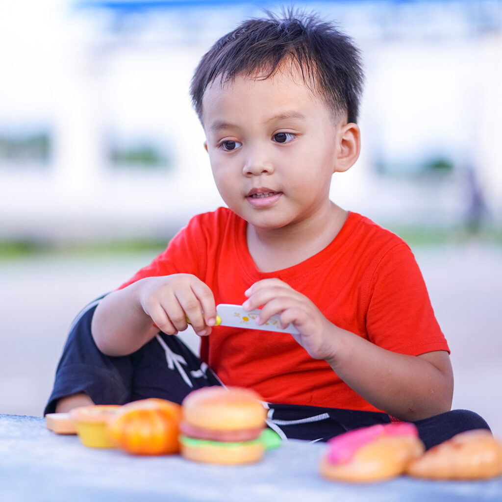 Child wearing red shirt
